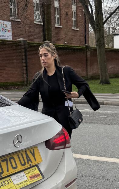 Sana Aslim, a beautician, getting into a white Mercedes.