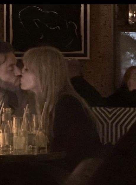 Olivia Attwood and Pete Wicks share a kiss at a bar in London.