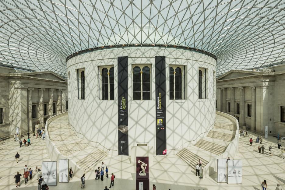 The Great Court of the British Museum with a circular central building and a glass and steel roof.