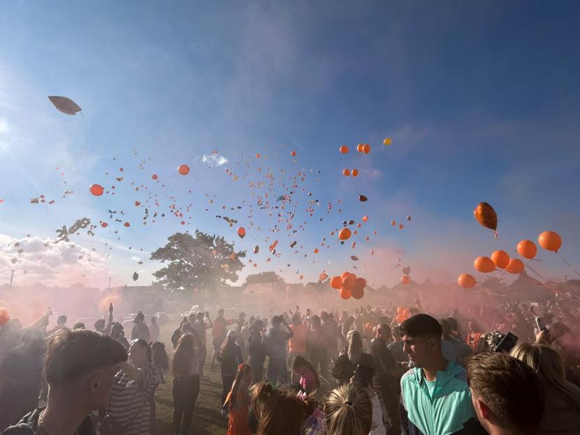 Crowds gather at a balloon release in memory of Jakub Matusiak.