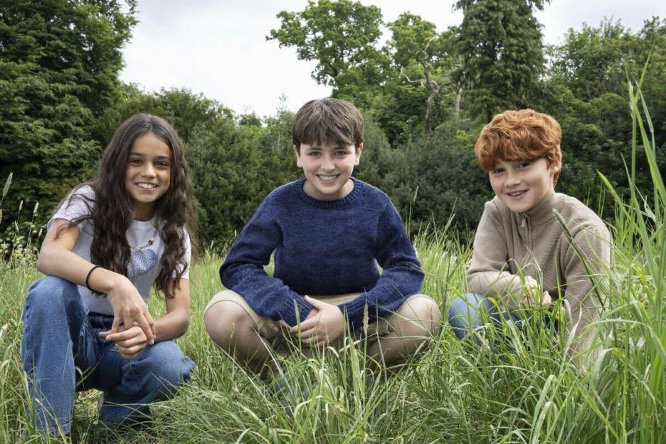 Actors Arabella Stanton, Dominic McLaughlin, and Alastair Stout portraying Hermione Granger, Harry Potter, and Ron Weasley for the HBO series "Harry Potter."