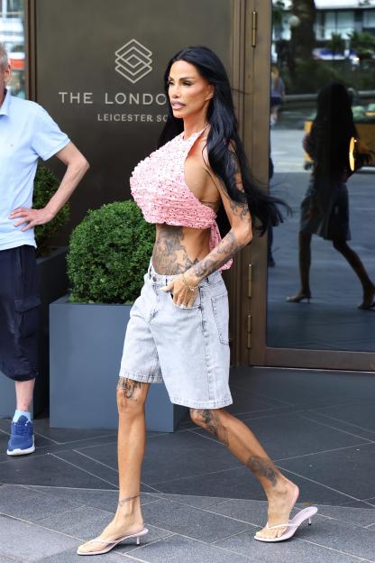 *PREMIUM-EXCLUSIVE* *MUST CALL FOR PRICING* Katie Price shows off the results of her lip lift surgery as she leaves a central London hotel