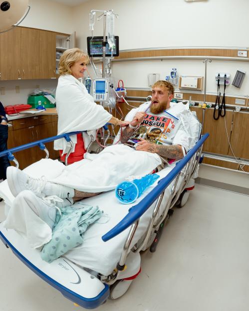 Jake Paul in a hospital bed with his mother Pam after the Anthony Joshua fight.