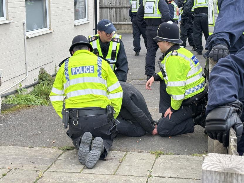 W8media..w8media Epsom High Street protest ..Crowds gather in Epson today and march towards the town hall. .Chaos erupts in the high street as protestors egg the police outside several hotels in the Surrey town of Epsom..Please see story for more inf