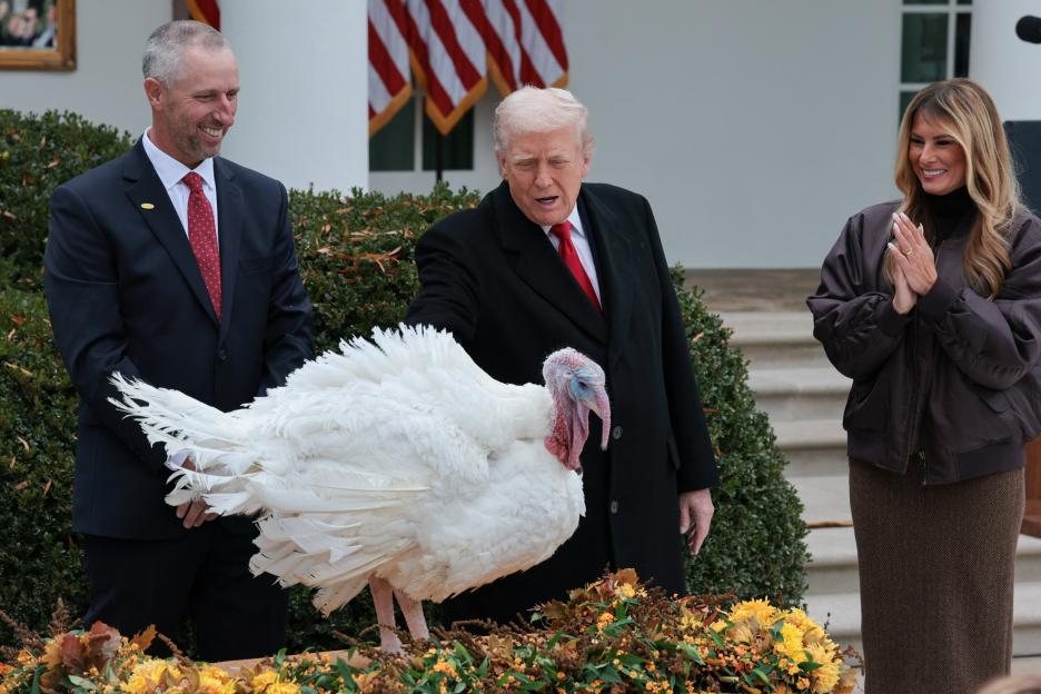 President Donald Trump and Melania Trump with a turkey named Gobble at the annual pardoning of the Thanksgiving turkey.