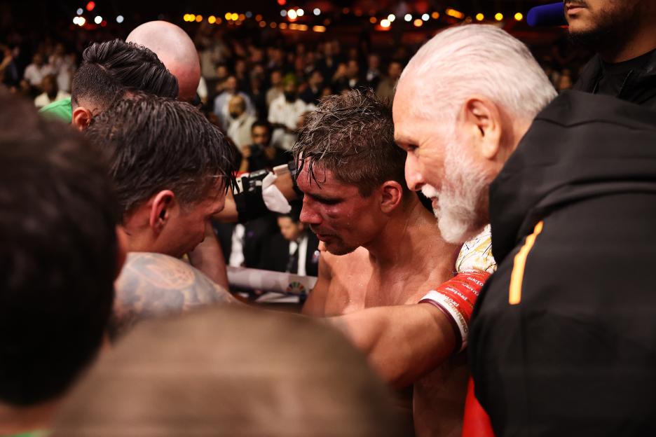 Glory in Giza Fight Night boxer in the ring with his coaches.