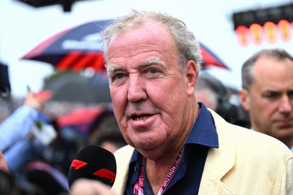 Jeremy Clarkson speaking into a microphone at the Formula 1 Qatar Airways Grand Prix.