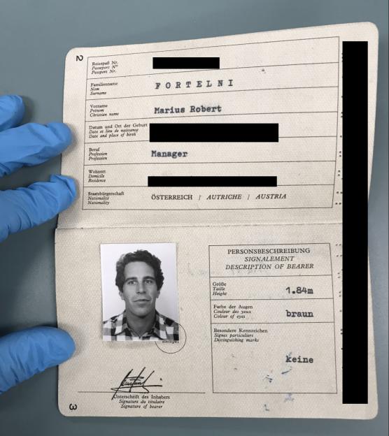 A person in blue gloves holds up a fake Austrian passport for "Marius Robert Fortelni," showing a black-and-white photo of a young man, a listed profession of "Manager," brown eyes, and a height of 1.84m.
