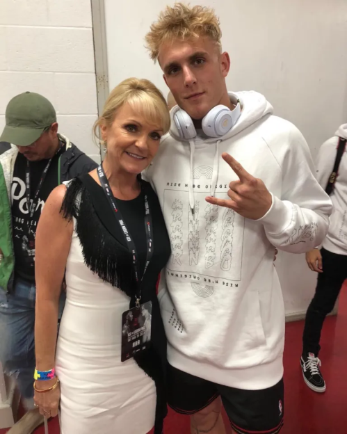 Jake Paul and a woman posing for a photo.