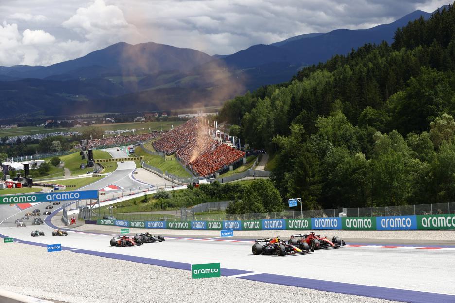 Formula One Austrian Grand Prix with Max Verstappen, Charles Leclerc, Carlos Sainz, and Lewis Hamilton racing on the track.