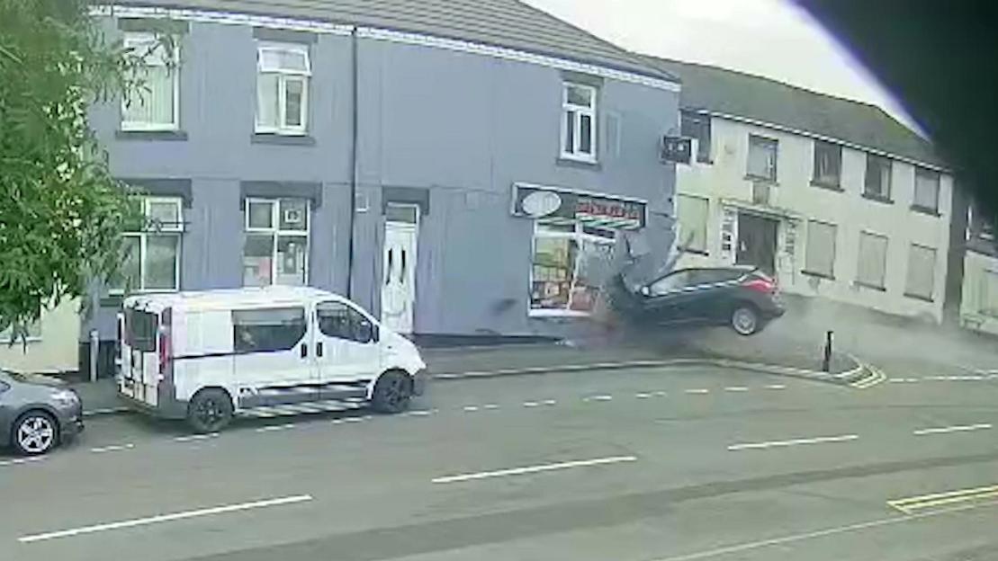 Shocking Incident: 21-Year-Old Crashes Car into Kebab Shop While on Phone, Causing Front to Collapse