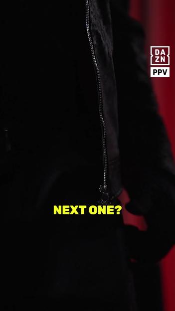 A person in a black jacket and a black shirt.