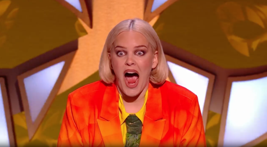 Anne-Marie with a surprised expression.