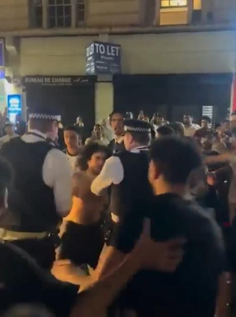 Egyptian fans battling police in London.