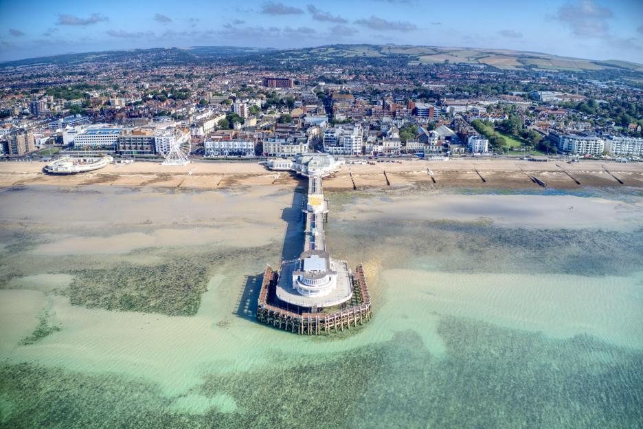 Aerial view of Worthing Pier, a Victorian structure, on the seafront of West Sussex resort.