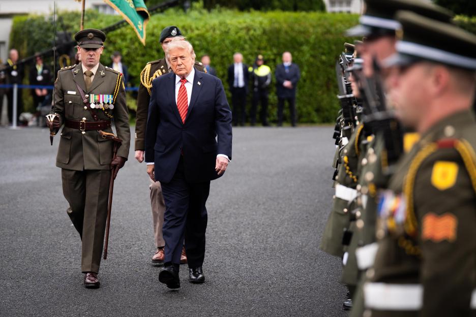 US President Donald Trump views the guard of honour outside Aras an Uachtarain in Dublin.