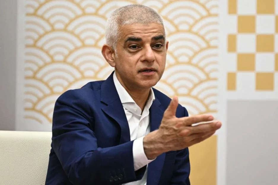 London's Mayor Sadiq Khan gestures during a meeting.