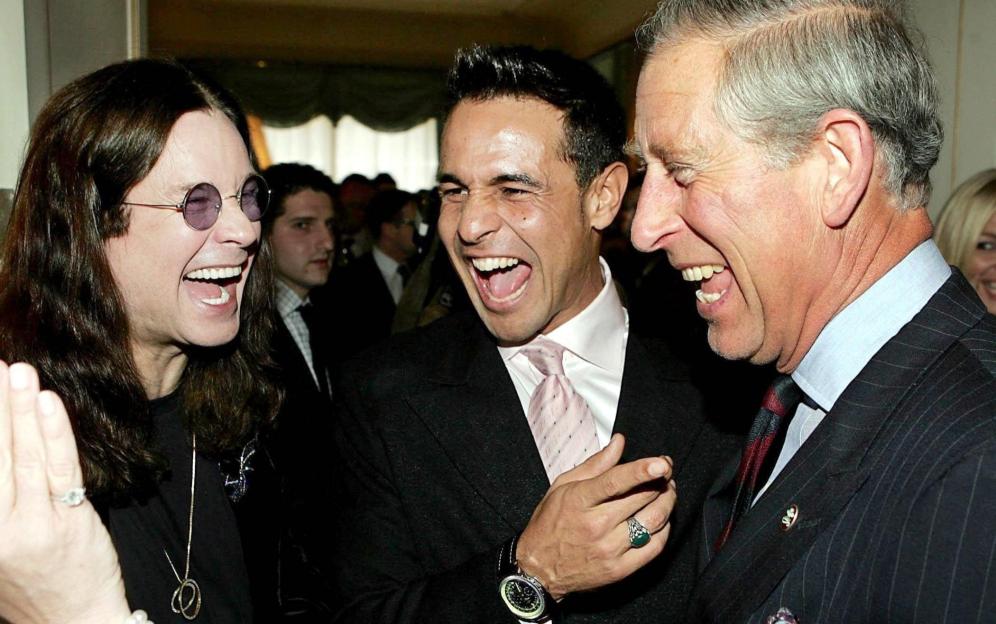 Ozzy Osbourne, Chico, and Prince Charles laughing together.