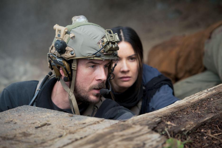 Barry Sloane and Olivia Munn in "SIX".
