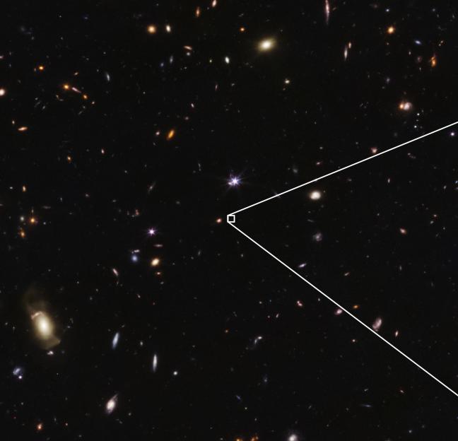 A deep field image of the universe with countless galaxies and a white trapezoidal outline indicating a specific region.