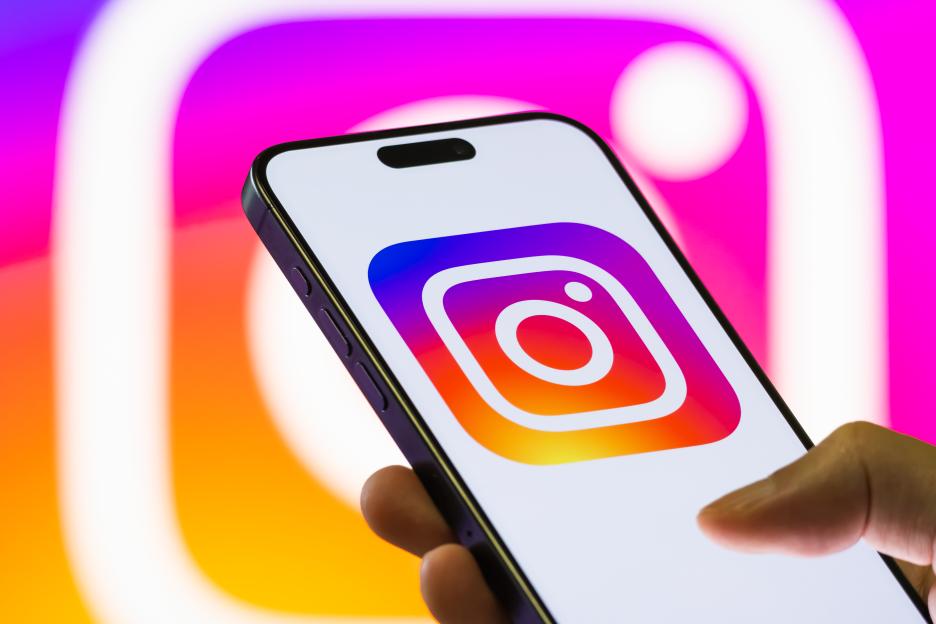 Instagram Logo Displayed On Smartphone Screen