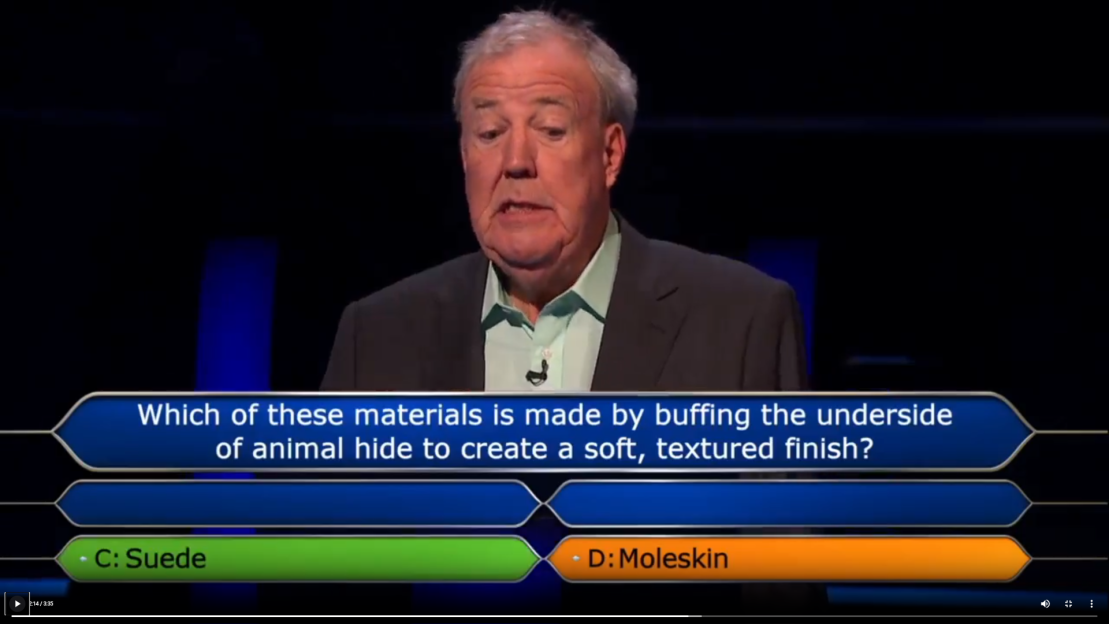 Jeremy Clarkson looking frustrated on Who Wants To Be A Millionaire, with "Suede" highlighted as the incorrect answer to a question about animal hide materials.