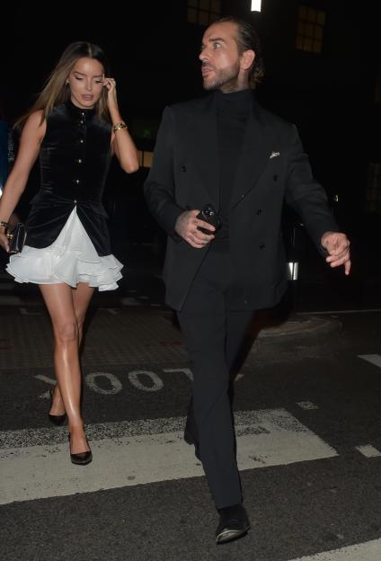 Maura Higgins and Pete Wicks walking together on a date night.