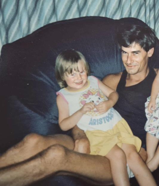 Simon Edney sitting with his daughters Sarah and Cheryl.