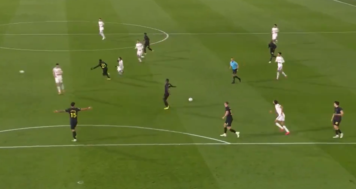 Football players in a night game.