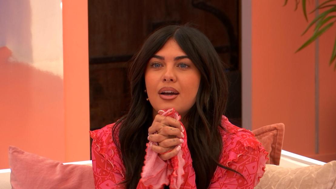 Belle from Love Island All Stars, looking surprised or concerned.