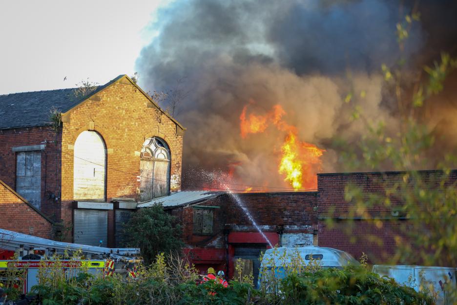 Massive Blaze Engulfs Building as Firefighters Tackle Inferno; Residents Urged to Stay Clear
