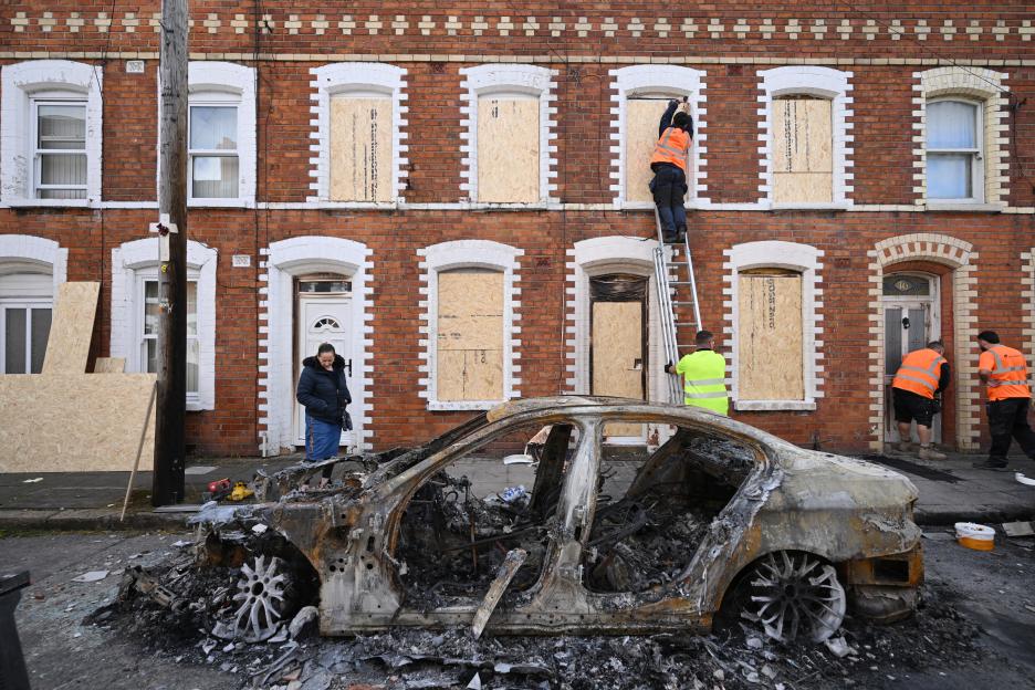 Cleanup and repairs after anti-immigrant riots in Belfast, Northern Ireland.