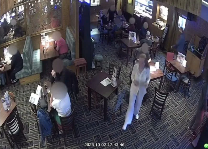 CCTV footage shows 68-year-old Rose Johnston in a pub.