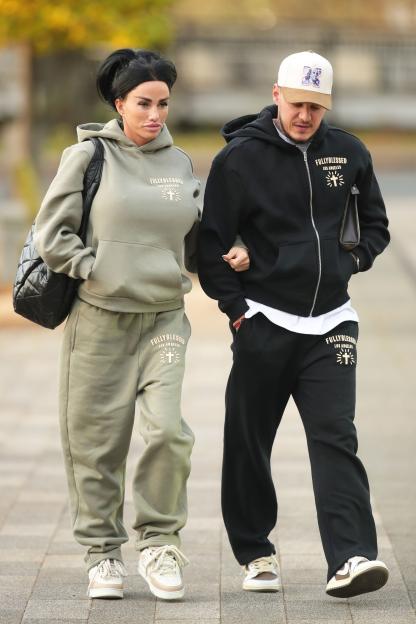 Katie Price and JJ Slater walk arm-in-arm to pantomime rehearsals.
