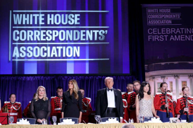 Donald Trump and Melania Trump standing at a White House Correspondents' Association event.