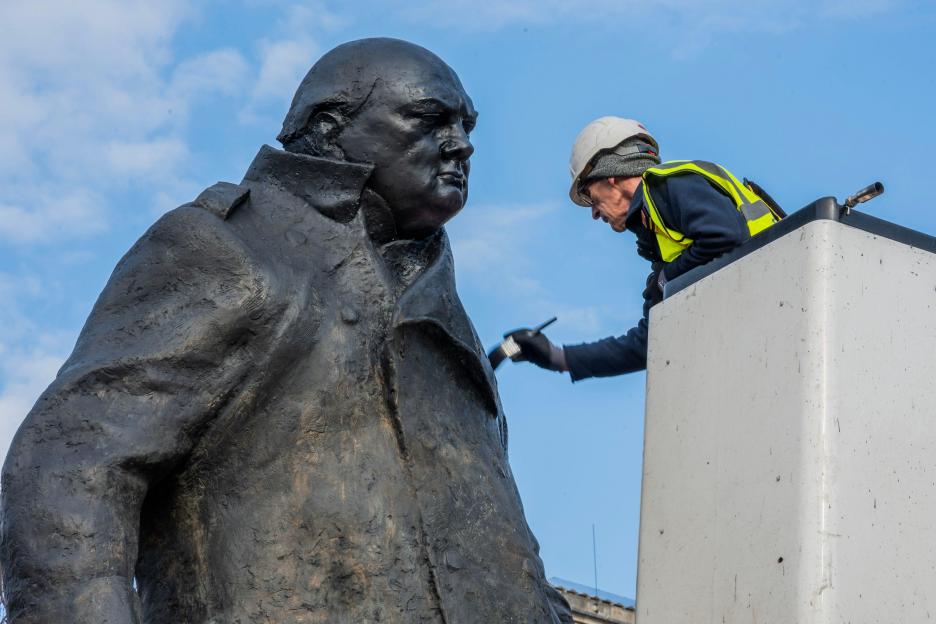 London, UK. 3rd Mar, 2026. The Winston Churchill statue is restored (after the recent graffiti attack), in Parliament Square, London. DBR, a specialist conservation company dealing with the cleaning and repair of historic fabric, re bronzes the statu