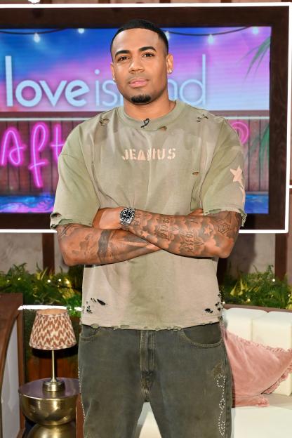 Tyrique Hyde from Love Island Aftersun posing with arms crossed.