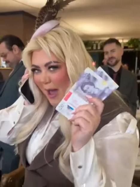 Gemma Collins holds up cash after winning at Cheltenham.