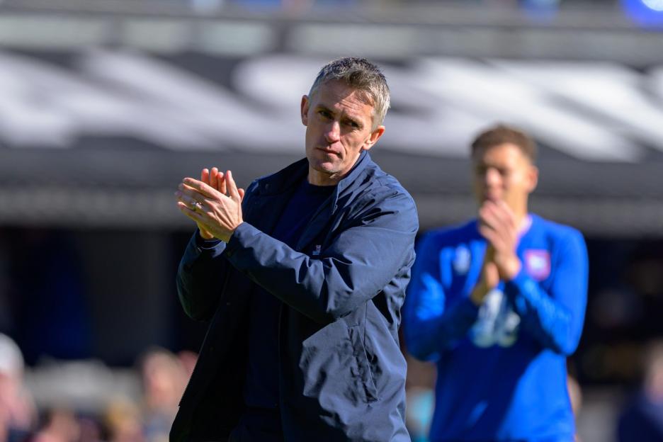 Ipswich, UK. 21st Mar, 2026. IPSWICH, ENGLAND MARCH 21 - Kieran McKenna Head Coach of Ipswich Town claps fans after the Sky Bet Championship game between Ipswich Town and Millwall FC at Portman Road on March 21, 2026 in Ipswich, England. (Photo by Ke