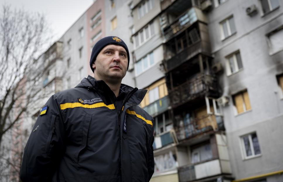 'Meet the Unsung Heroes of Ukraine's Home Guard: Unarmed Men Bravely Rescuing Lives from Burning Buildings Under Missile Attack'