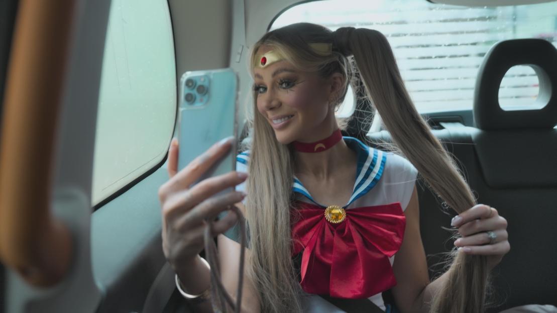 Olivia Attwood taking a selfie while dressed as Sailor Moon.