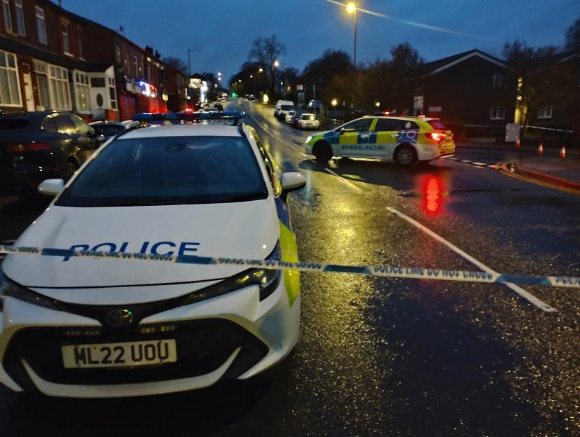 Police and emergency crews at the scene of a horrific car crash
