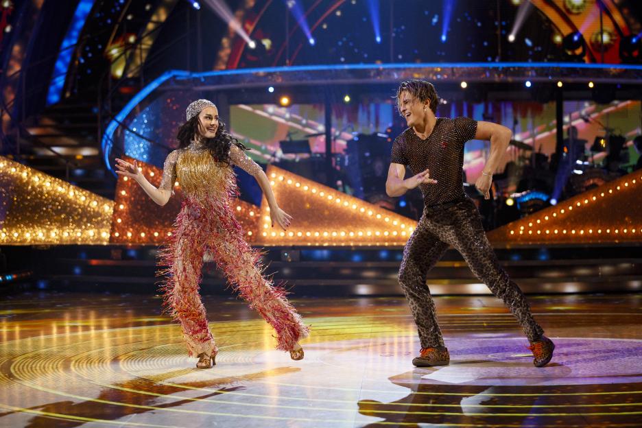 Amber Davies and Nikita Kuzmin performing during a live show.