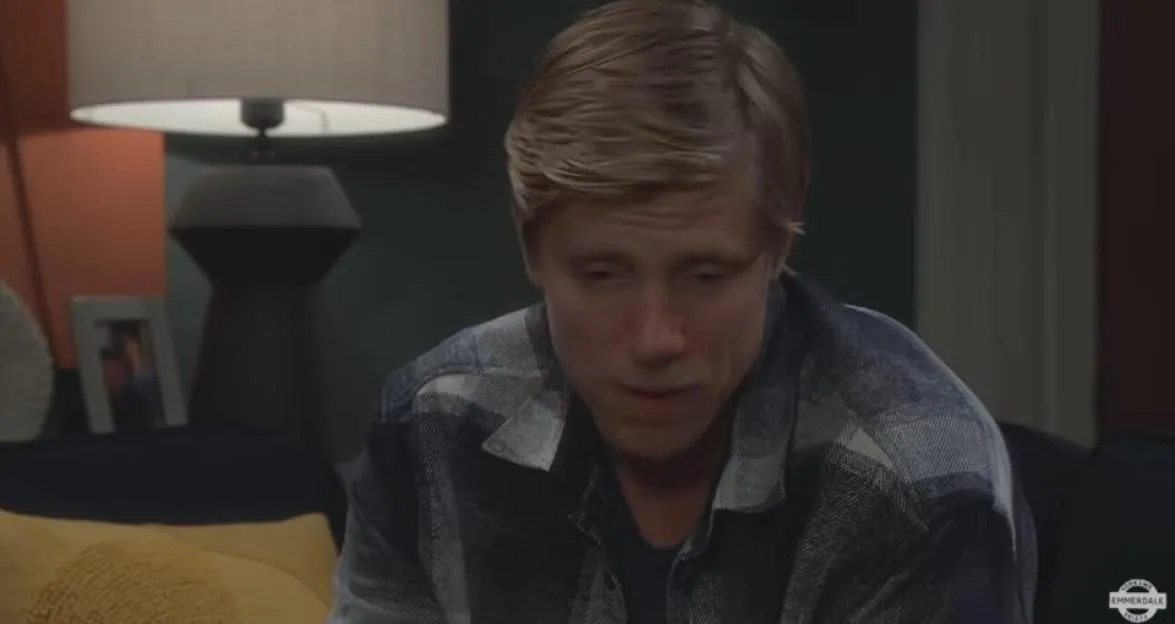 Robert Sugden looking concerned during a scene in Emmerdale.