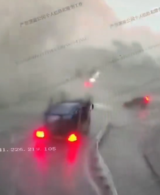 A van tossed by a weak tornado on a road.