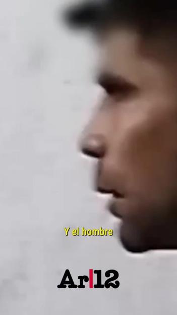 Side profile of a man with Spanish text "Y el hombre" (And the man) and "Ar|12".