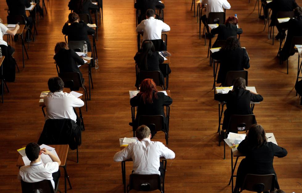 dated 02/03/12 of a pupils taking an exam. Teenagers who moved from primary to secondary school in the middle of the pandemic are waking up to their GCSE results, with more than one in five entries expected to score the top grades. Pupils