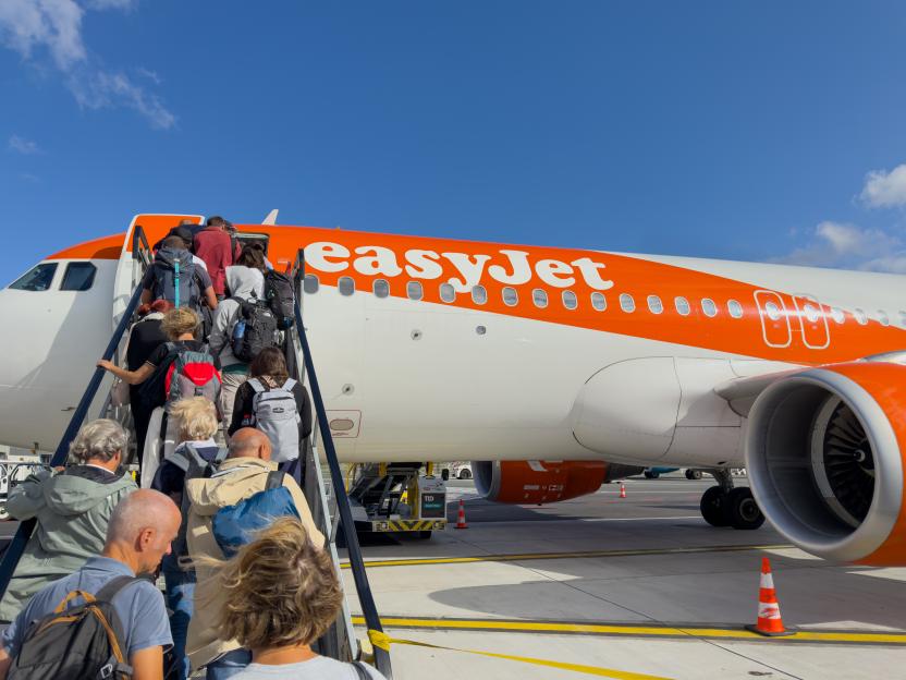 Passengers boarding an Easyjet airplane at Nantes Atlantique Airport.