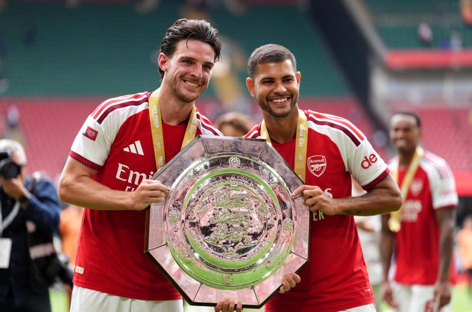 Declan Rice and Bruno Guimaraes celebrating with the FA Community Shield.