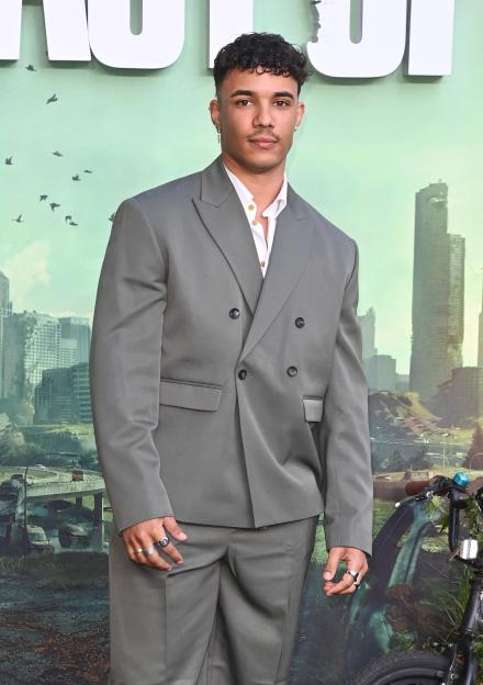 Freddie Fraser on the red carpet at "The Last of Us" Season 2 UK Premiere.